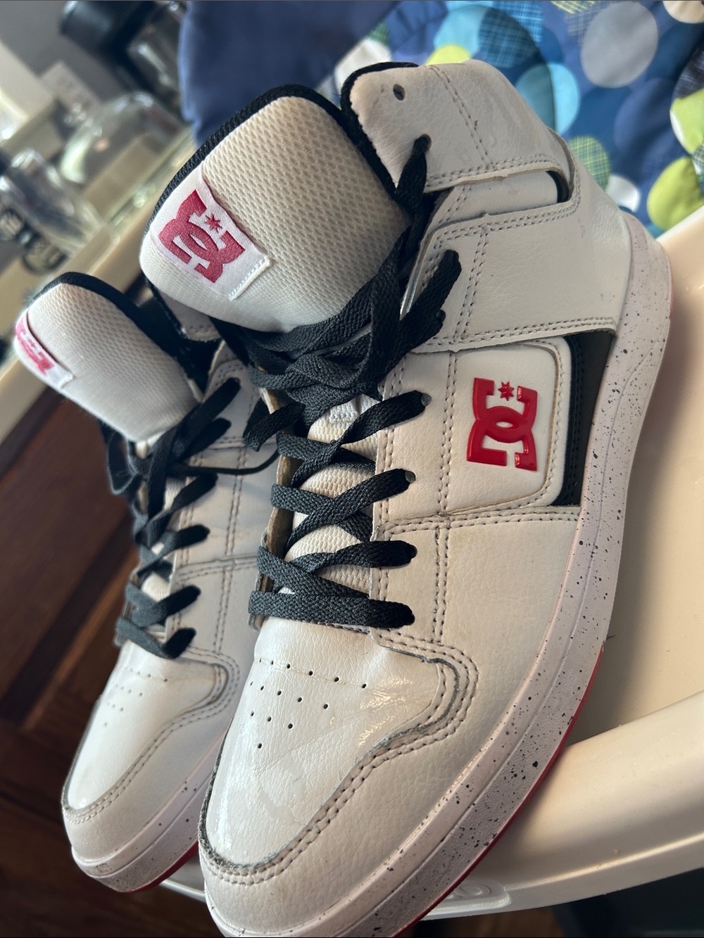 DC White and Black High-Top Sneakers with Red Logo Accents
